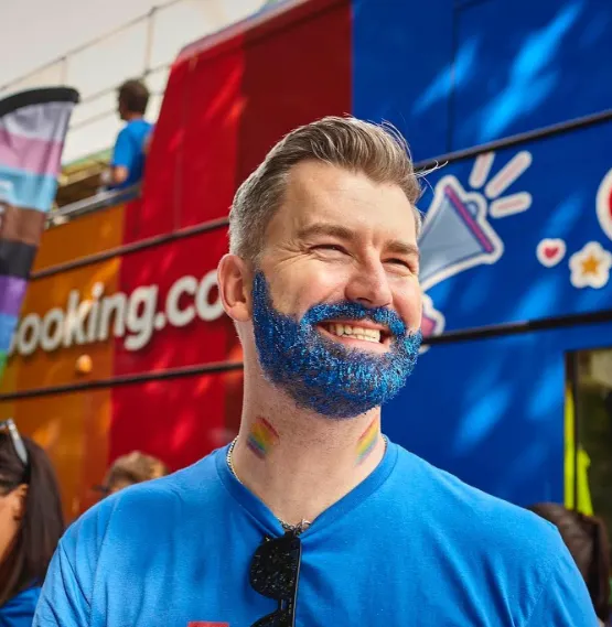 Booking.com LGBTQIA+ ERG Shines at Manchester Pride Parade with Double-Decker Bus detail 4