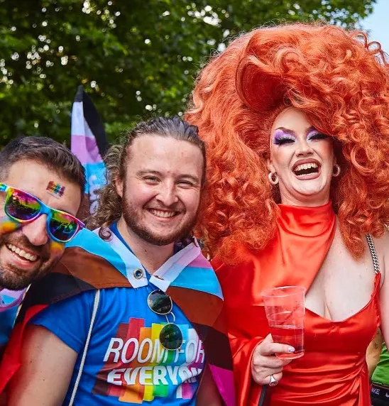 Booking.com LGBTQIA+ ERG Shines at Manchester Pride Parade with Double-Decker Bus detail 2